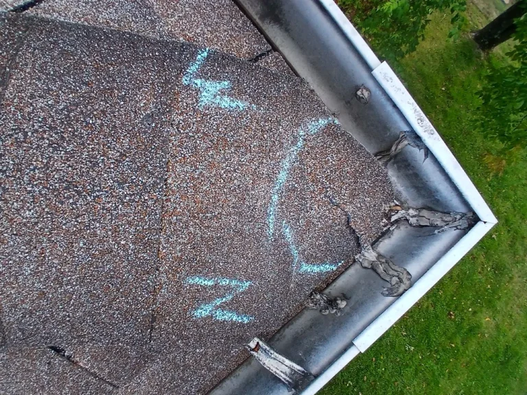 Hail dents on a gutter documented during a Cincinnati, Ohio storm inspection