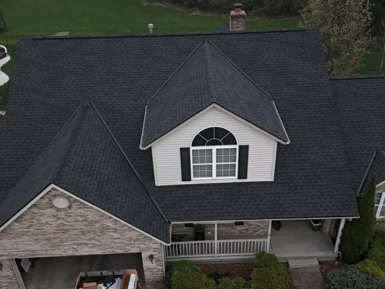 New dark asphalt shingle roof on a two-story home in Middletown, Ohio